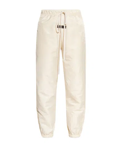 Essentials Fear Of God  Logo Patch Drawstring Track Pants In Nude
