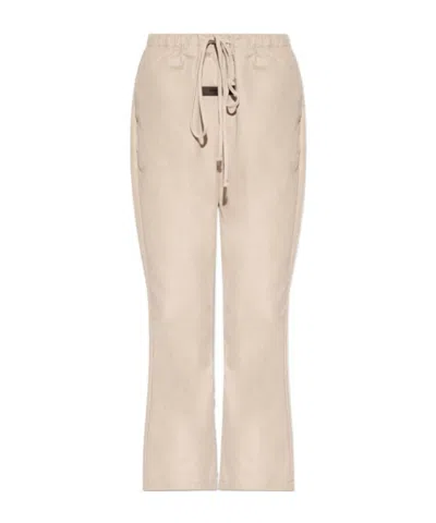Essentials Front Logo-patch Detail Trousers In Nude