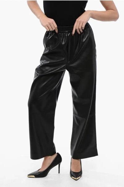 Nanushka Faux Leather Odessa Loose Fit Pants With Drawstring Waist In Black