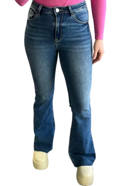 Risen High Rise Raw Cut Flare Jeans In Dark Wash In Blue