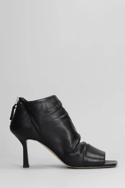 THE SELLER THE SELLER HIGH HEELS ANKLE BOOTS