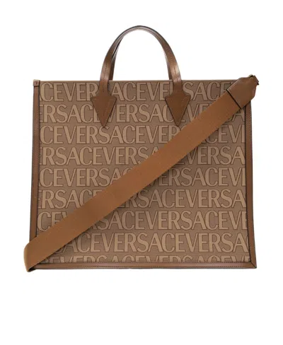 Versace Allover Tote Bag In Brown