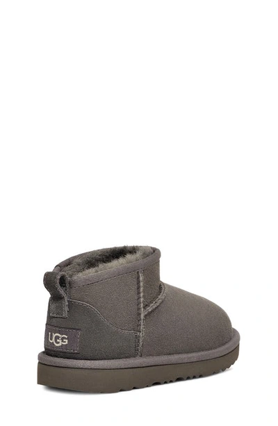 UGG UGG(R) KIDS' CLASSIC ULTRA WATER RESISTANT GENUINE SHEARLING MINI BOOT 