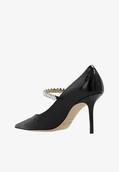 Shop Jimmy Choo Bing 85 Crystal-embellished Pumps In Patent Leather In Black